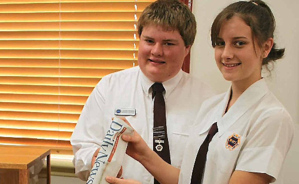 A copy of the Daily News and photos are among the many things that will be included in the WSHS centenary time capsule before it is sealed by school captains Jacob Stevens and Gabby McCosker. A copy of the Daily News and photos are among the many things that will be included in the WSHS centenary time capsule before it is sealed by school captains Jacob Stevens and Gabby McCosker.